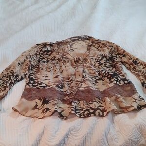 Long sleeve sheer animal print blouse